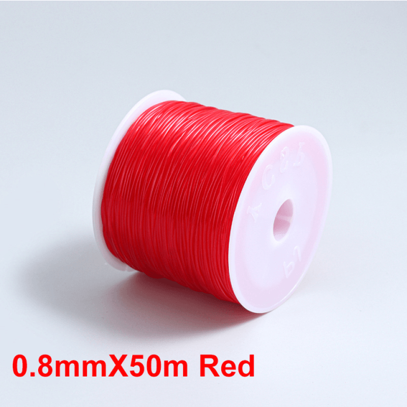 a red object sitting on top of a table 
