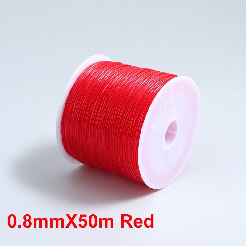 a red object sitting on top of a table 