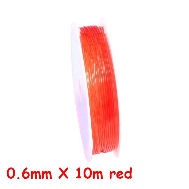 a close up of a red tie on a bench 