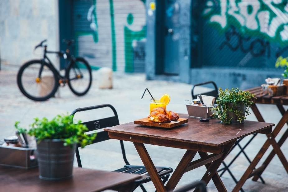 a table with a vase of flowers on it 