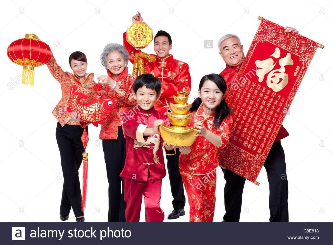 a group of people standing in front of a laptop 