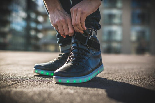 a man standing on top of a skateboard 